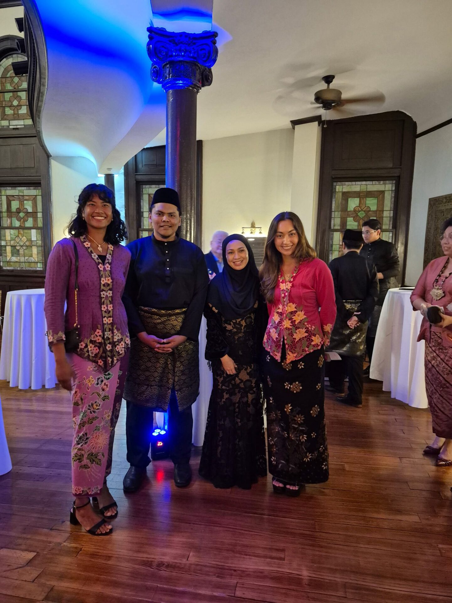 Tasha at an official Malaysian event with fellow Malaysians