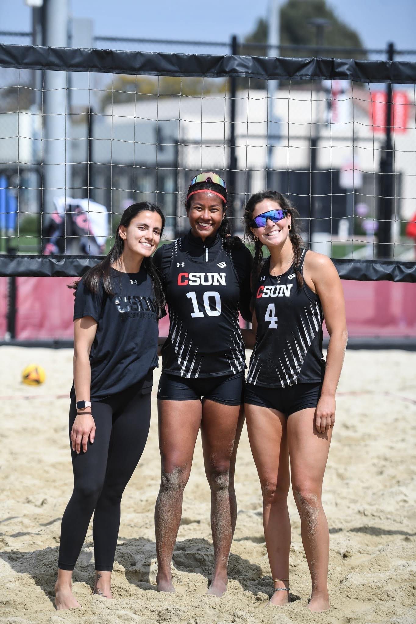 Tasha Mae with volleyball team members